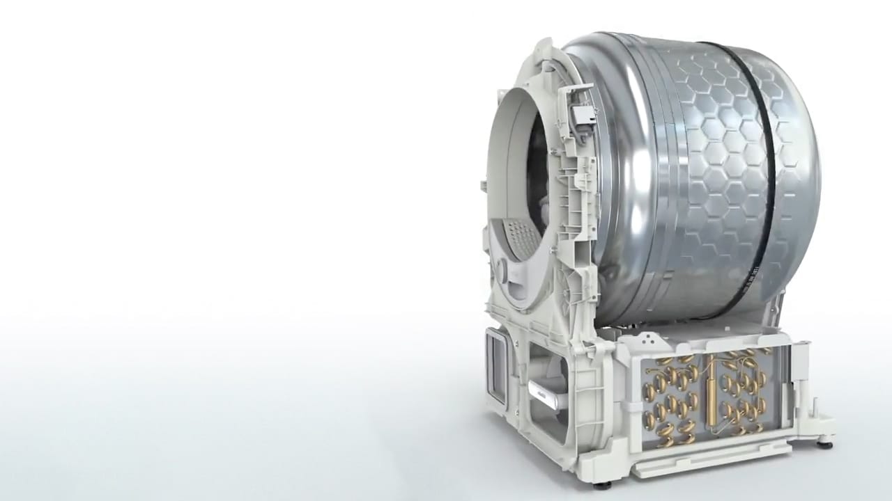 The tech inside of a Miele heat pump dryer