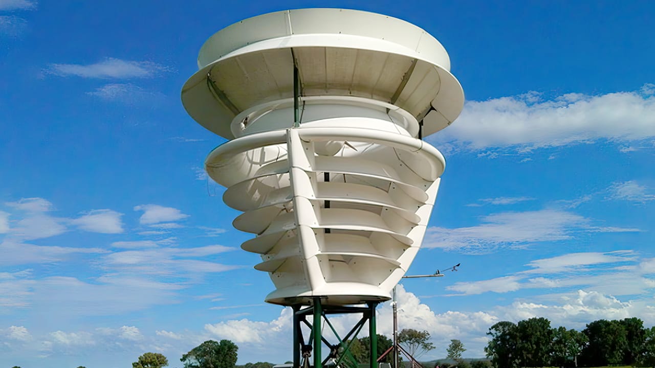 A shroud covered rooftop wind turbine