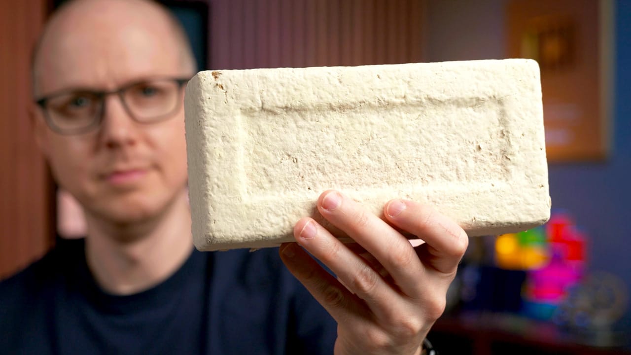 Matt Ferrell holding a MycoComposite block